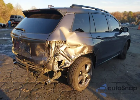 2021 Honda Passport 2Wd Touring z USA, uszkodzony, nr VIN 5FNYF7H98MB012918